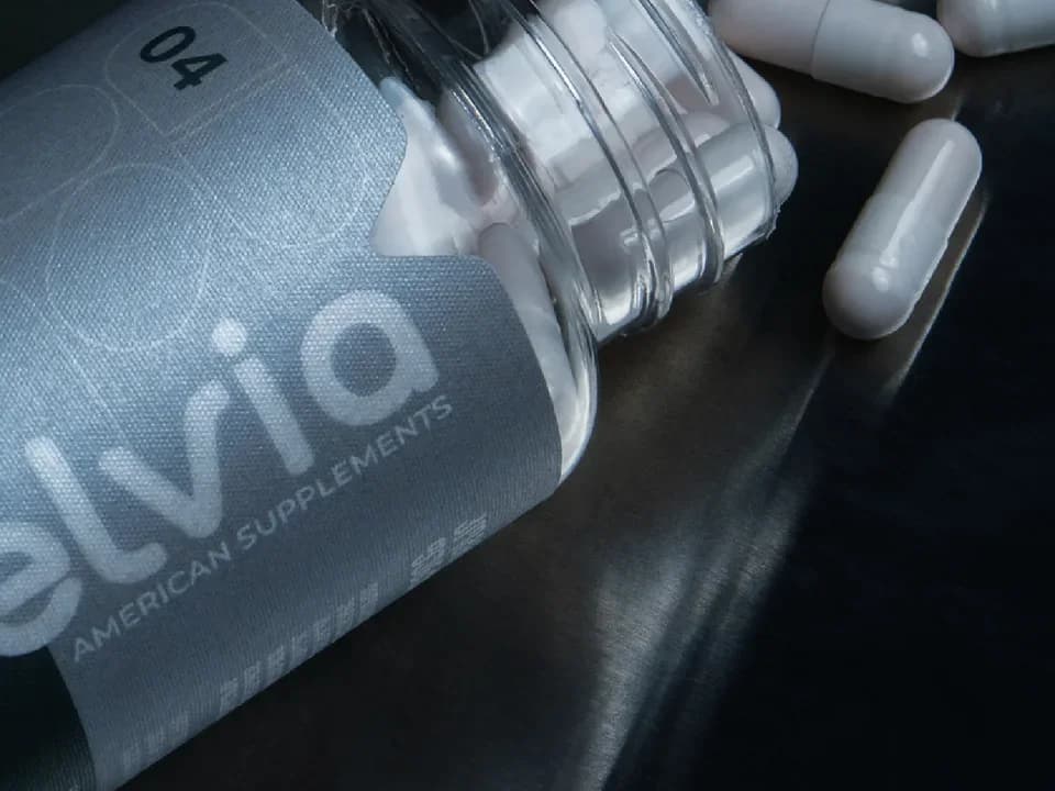 Reflective detail: the textured Velvia label on a capsule bottle
